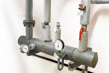 control and measuring devices stand on the pipes