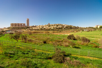 Hdr image of the gazelle valley in winter, against the background of the buildings of neighborhoods...