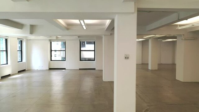 Slider View Right of an Empty White Office Space