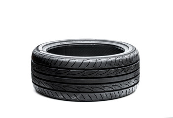 Brand new asymmetric type low profile sport tyre isolated on white