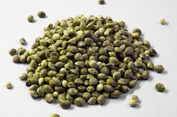hemp seeds  macro image on white background