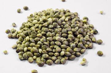 hemp seeds  macro image on white background