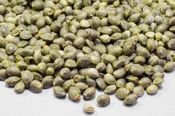 hemp seeds  macro image on white background