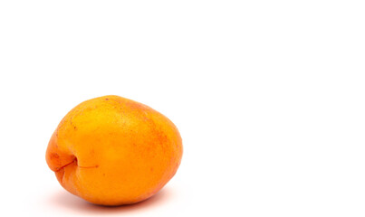 Natural ripe apricot on a white background, fruit without chemicals
