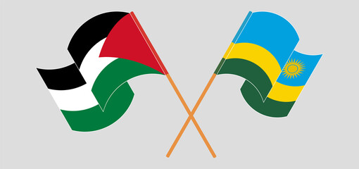 Crossed and waving flags of Palestine and Rwanda