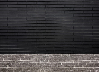 The black brick wall is half gray. Background and texture of a brick wall.