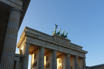 Brandenburg Gate in the Mitte quarter of Berlin, Germany. The Brandenburger Tor is an 18th-century neoclassical monument in the German Capital and one of the best known landmarks of Germany