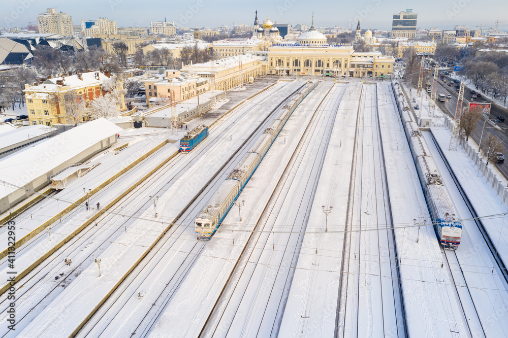 Wall mural Aerial view to snowed rail station in Odessa In Ukraine in winter morning