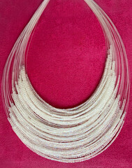 Women's necklace made of white beads