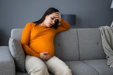 Pregnant Sick Woman With Headache, Discomfort