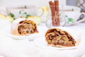 Apple strudel with cinnamon, nuts.