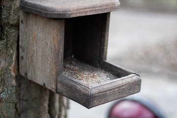 Little wood birdhouse on the tree