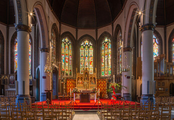 BRUGES, BELGIUM - JUNE 13, 2014: Nave and presbytery of Saint Giles gothic church (Sint Gilliskerk).