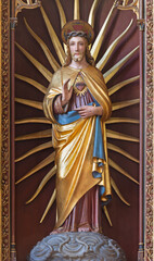 BRUGGE, BELGIUM - JUNE 13, 2014: The carved polychrome statue of Heart of Jesus in st. Giles (Sint...