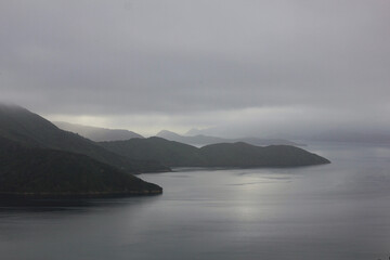 Coast line in the Marlborough Sounds on a cloudy day.