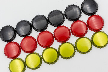 German flag consisting of different coloured crown corks in black, red and gold, symbolic of the German desire for beer