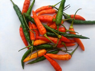 Red and green chillies on the table