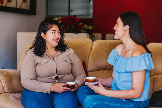 Latin Girls Having Fun At Home, Laughing And Drinking Coffee In Mexico City