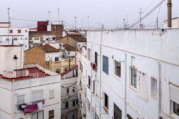 Fototapeta na wymiar Residential Spanish neighborhood overlooking the rooftops in Valencia, Spain