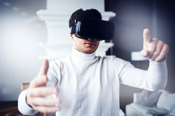 the programmed screen graph is in the air. watches videos and works in virtual reality. 3d glasses of black color on the face. 5G data transmission modern digital technology is available.