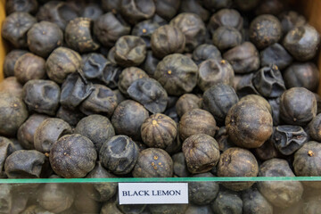 Dried black lemons for sale in the souk in Nizwa, Oman.
