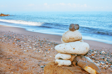 Fototapeta na wymiar Balanced rocks by the sea