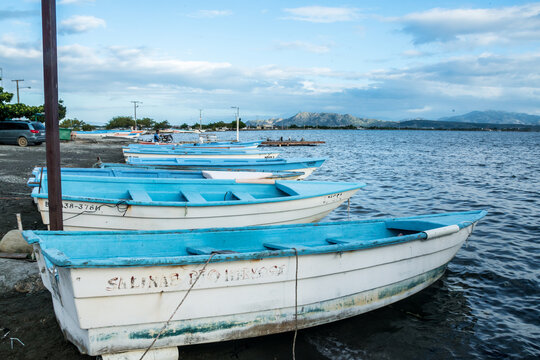 Dramatic image of fishing boats lined up on the Caribbean coast ready for fishing, in the Dominican Republic.