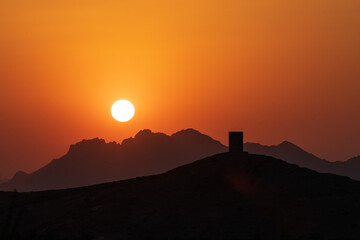 Sunset over the mountains in Nizwa, Oman.