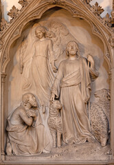 Fototapeta na wymiar LONDON, GREAT BRITAIN - SEPTEMBER 19, 2017: The marble relief of Jesus as the Good Shepherd in church St Stephen's Rochester Row by G.G. Adams (1855).
