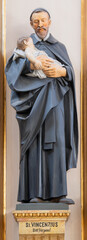 VIENNA, AUSTIRA - OCTOBER 22, 2020: The carved polychome sculpture of  St. Vincent de Paul in the...
