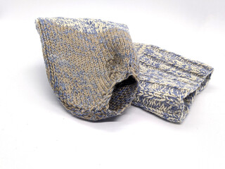 leaky woolen sock. one holey woolen sock on a white background side view