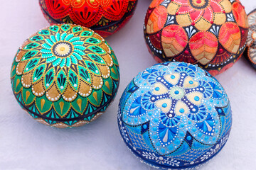 Souvenirs at the city festive fair, wooden beautiful boxes for sale. 