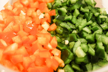 Sliced green and red peppers