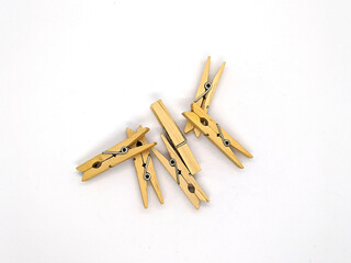 clothespins. wooden clothespins on a white background top view