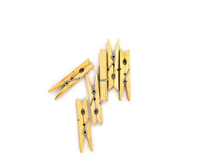 clothespins. wooden clothespins on a white background top view