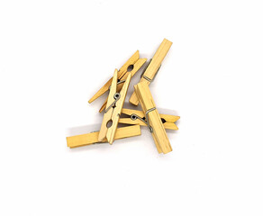 clothespins. wooden clothespins on a white background top view