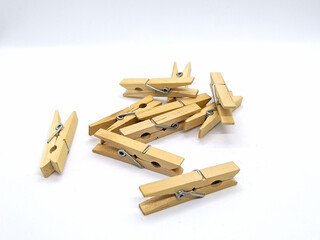 clothespins. wooden clothespins on a white background side view