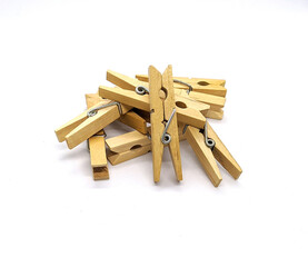 clothespins. wooden clothespins on a white background side view