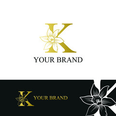 Golden Luxury Initial letter K with March Daffodils narcissus flower for cosmetic, Jewelry, boutique, hotel logo concept vector