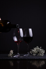 Red wine and two glasses for a romantic date night