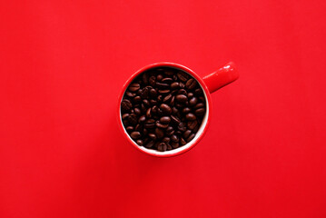 Black coffee cup on background with Coffee beans