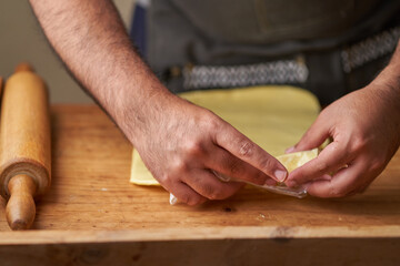 Chef at home cooking whit butter
