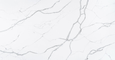 This quartz slab is designed to mimic the look of Statuario Marble. It contains bold grey veins...