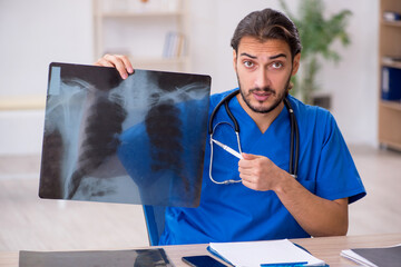 Young male doctor radiologist working in the clinic
