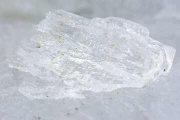 Unusual shapes and textures of ice crystals close-up shallow dof with copy space.