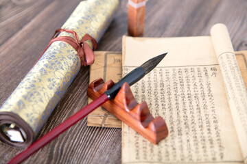Put away the brush and ancient books and scroll painting works beside them