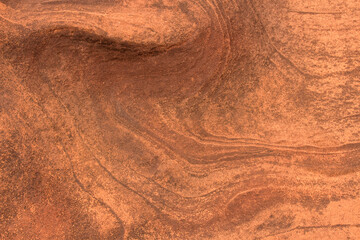 Water erosion on sandstone floors Abstract orange background