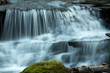 Fototapeta na wymiar Silky water of little Wadsworth Falls in Middlefield, Connecticut.