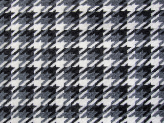 Tweed fabric houndstooth texture, wool pattern close up, woven textile background