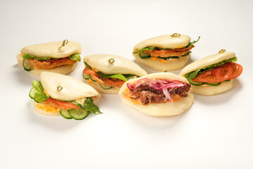 Bao buns. Hawaiian dish on white background. Pan-Asian cuisine concept. Close-up